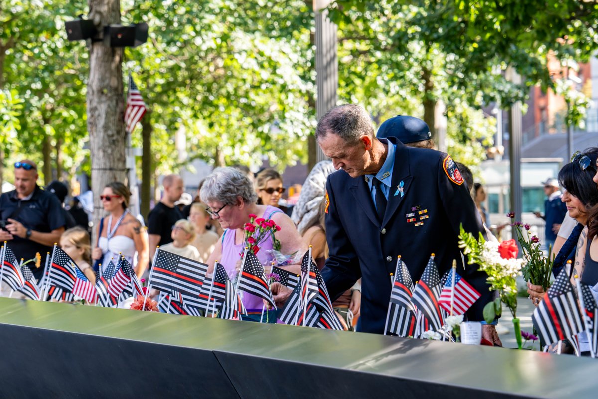 ChinaDaily's tweet photo. People mourn for the victims at the National September 11 Memorial & Museum in New York, the United States, Sept 11, 2025. Thursday marked the 24th anniversary of the 9/11 attacks. #US #911Day #September11 https://t.co/dinLp5IK63