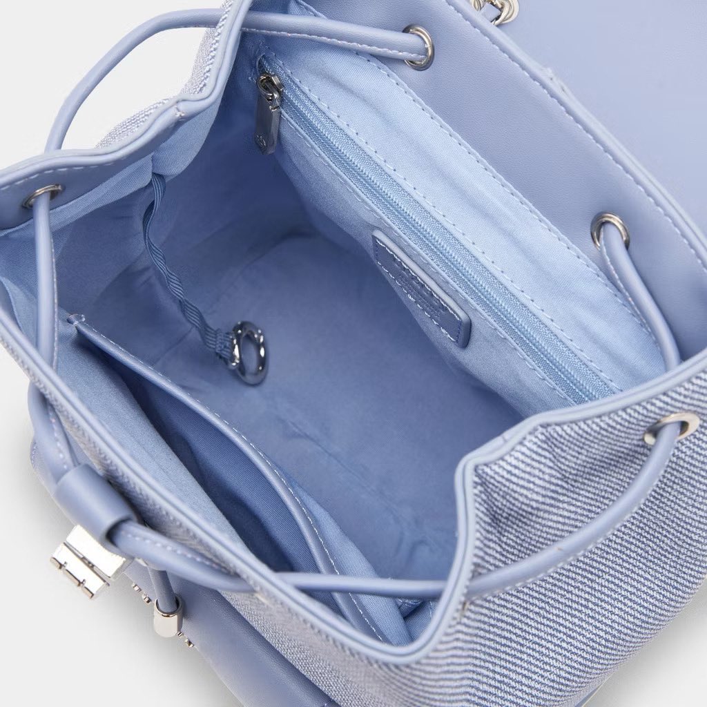 From work to hangout, this pastel blue backpack fits all.