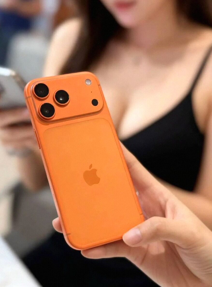 GEM_MEGA_MEME's tweet image. Yo, what&apos;s keeping you from snagging that sleek iPhone in bold Bitcoin orange? 🚀 #TechVibes