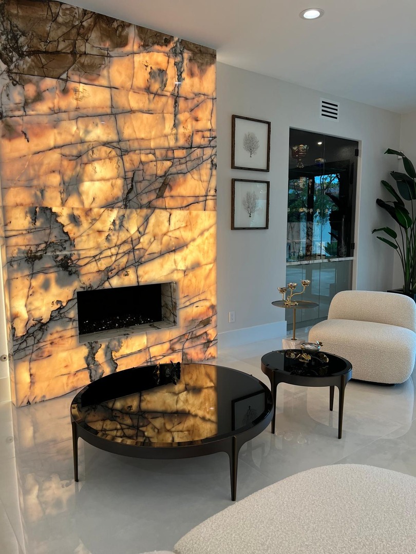 Transform your space with the mesmerizing glow of our Cristallo Vitrum at Elements Room. Discover elegant fireplace design and elevate your ambiance with the stunning backlit fireplace that becomes the focal point of any room.

Design: @advanced_home_services