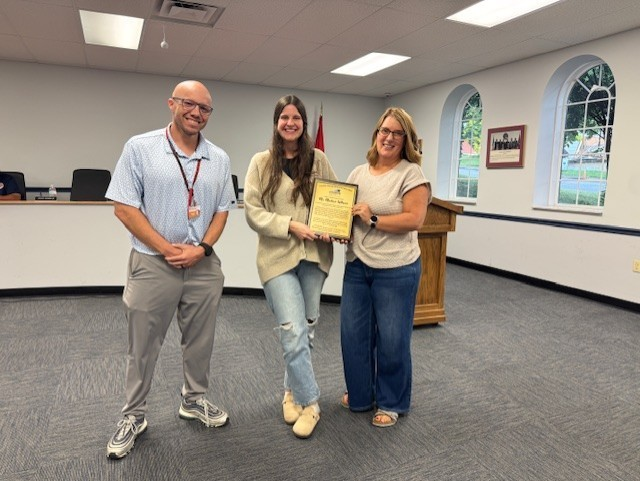 Fort Loudoun Middle School teacher Madison Williams was recognized by the School Board last night for her courageous actions in saving a student from choking.  Presenting her a plaque of appreciation was Principal Blake Harris and Board Member Stephanie Hatcher.