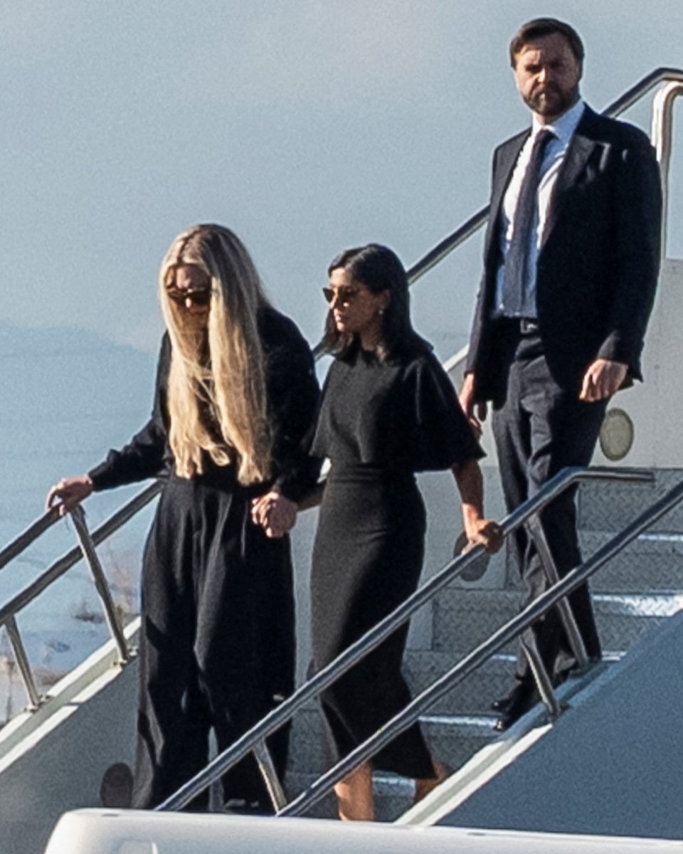 Charlie Kirk's widow, Erika Kirk, walks off Air Force Two hand-in-hand with  second lady Usha Vance and followed by Vice President JD Vance as they  arrive in Arizona with her husband's casket.