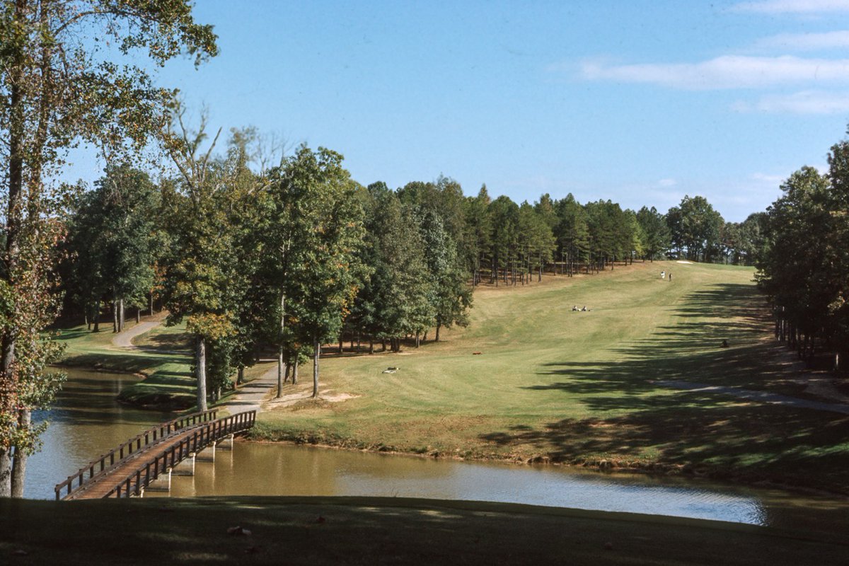 UGAGolfCourse's tweet image. ✨Happy Flashback Friday✨ Today we’re spotlighting #14, the scenic par 4 that somehow ensures you’ll lose one more ball to the pond before finishing your round.