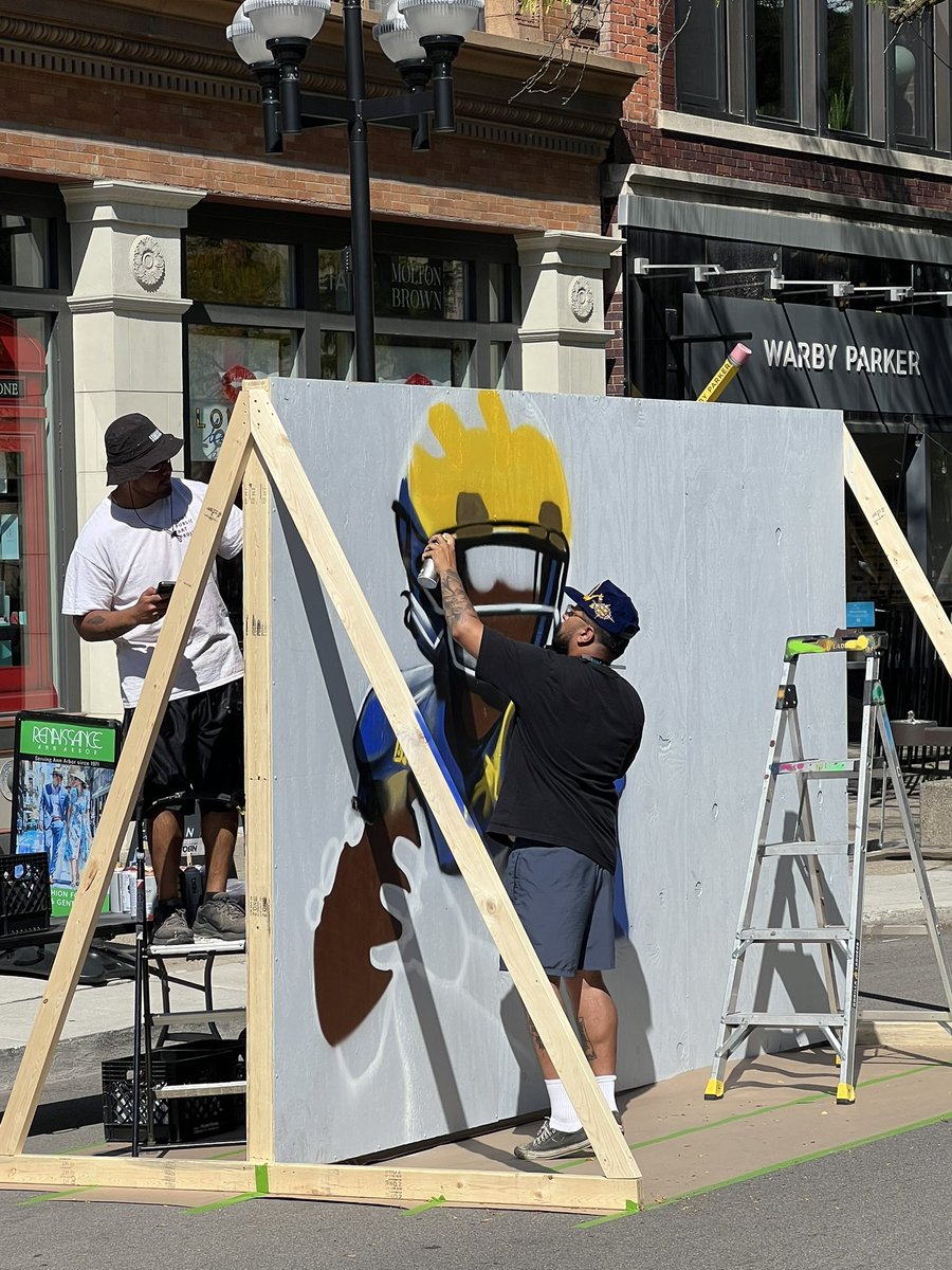 Welcome to Main Street in Ann Arbor, where a painting of Bryce Underwood is being done