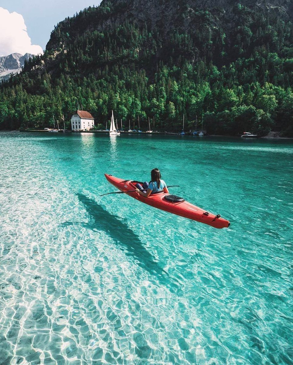 Kayaking on Plansee Lake in Austria.