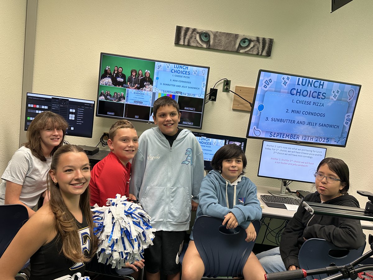 LegacyFISD's tweet photo. Spirit Day at Legacy! Students were so excited to have some Tigers come visit this morning and do the morning news broadcast. Big Cat Country!! https://t.co/aeE25z4sRq
