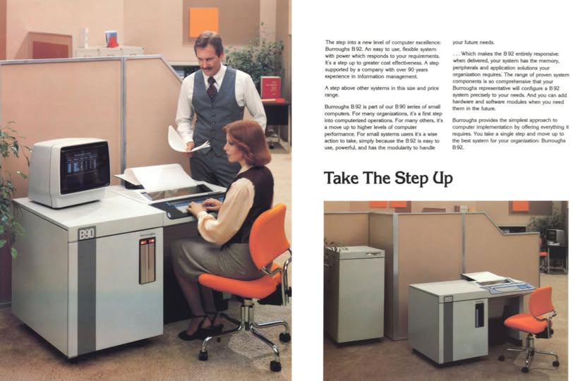 RetroAndreiBlog's tweet photo. In 1980, if you bought a Burroughs B90 for your office, you didn't need a desk - the computer was the desk.
And that "fridge" in the corner? About 200 MB of storage. The entry-level B92 cost a modest five-figure sum, giving you 128 KB of RAM and a COBOL compiler. 
#RetroComputing https://t.co/a3pvX2zmiy