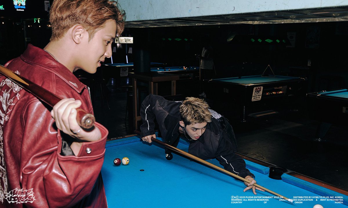 I steady my cue, eyes locked on the table but aware of Seungcheol’s gaze lingering just as sharp. The game feels less about winning and more about the unspoken tension between us, each shot echoing like a challenge, each glance like a secret no one else can read.