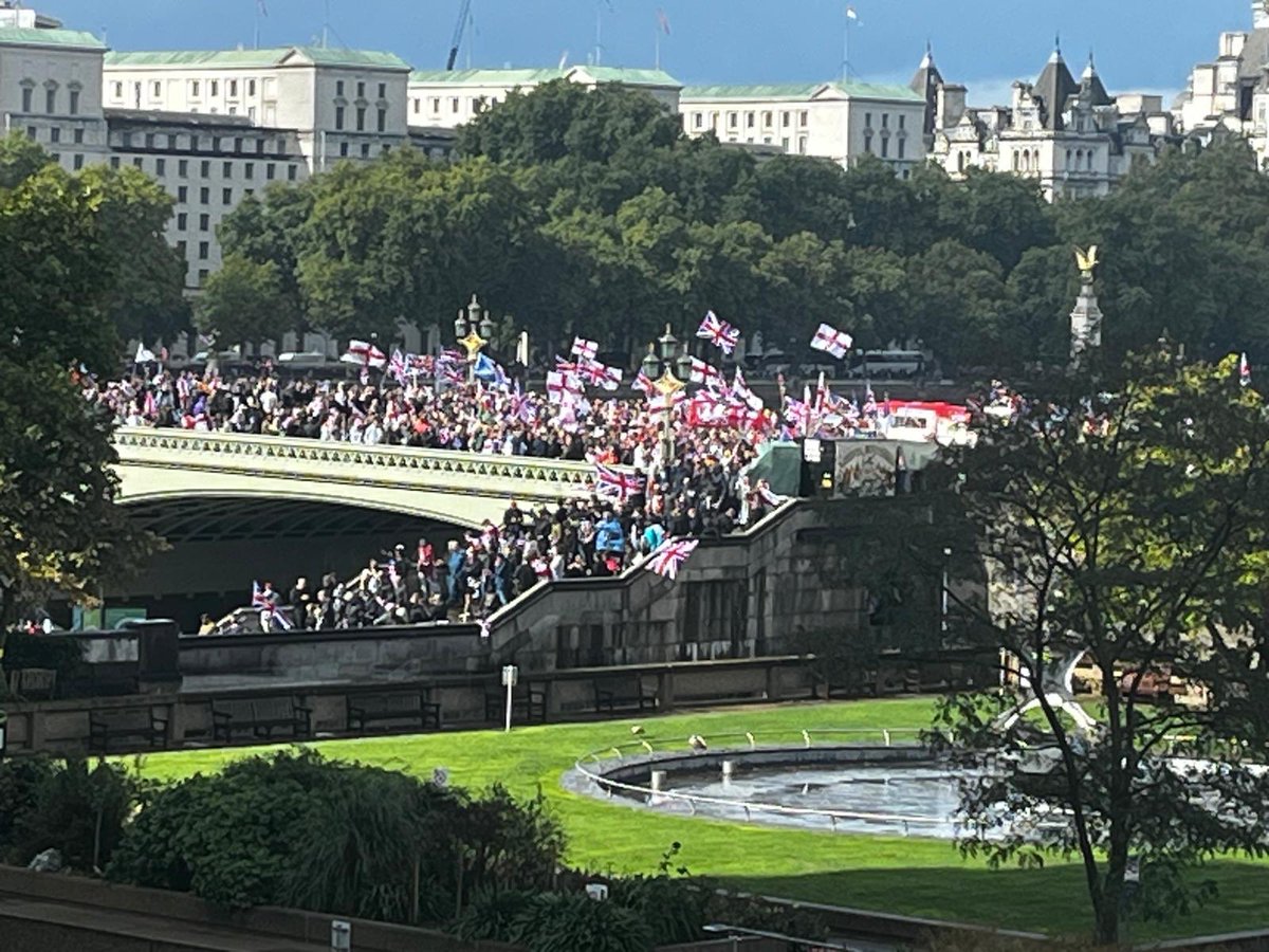 iFRCA's tweet photo. This far right racist march is concerning. The view from St Thomas’ hospital, the ethnically diverse staff are worried about travelling home after a hard days work of saving lives. What are the police or the gov doing? Isn’t this parade inciting racial hatred? @GOVUK @metpoliceuk https://t.co/cCKutI7kTk