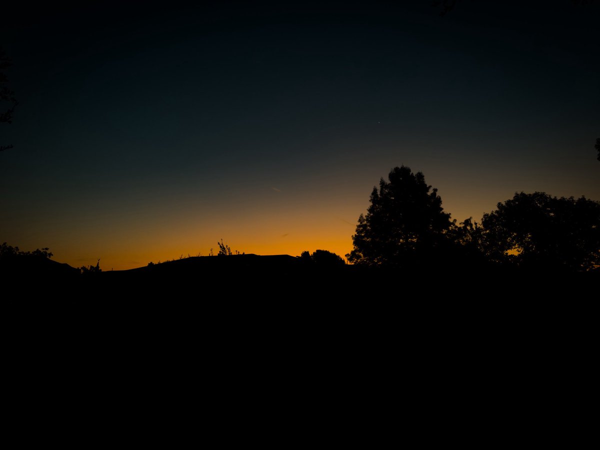 chilldragon21's tweet photo. The horizon softens,
a wash of pale gold spilling across the quiet.
Night folds itself away,
and the first light
presses gently against the world,
as if reminding us—
everything begins again. https://t.co/m6uYNFjo2m