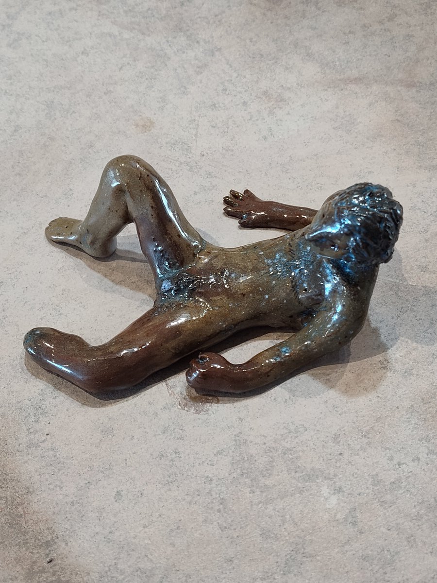 Fresh out of the kiln! Still warm! Very interesting effect. this glaze is rated for cone 6 but was fired at cone 5 + covered with a thick clear coat, made it so instead of a consistent mottled color my new glaze appeared as little starbursts. Further experiments needed