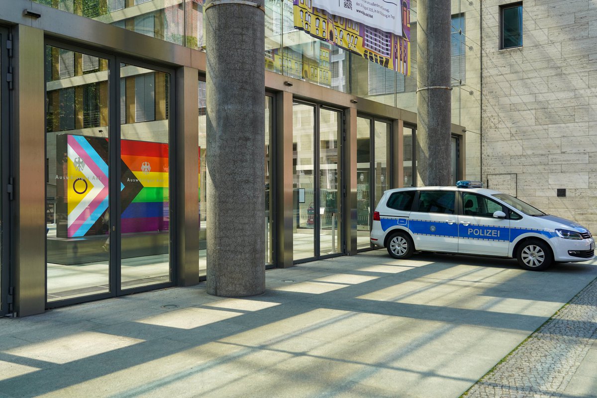 jreichelt's tweet image. The German government until now has not offered a single word on the political assassination of Charlie Kirk. Neither condemnation, nor condolences. Nothing. Meanwhile, the German foreign ministry is displaying the flag of Trans ideology at their entrance gate.
