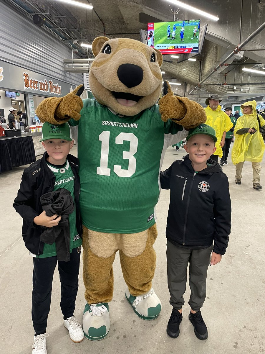 KitchenKC's tweet image. Braved the flooded streets to see our favourite mascot and team. @sskroughriders #Riders #RidersLive