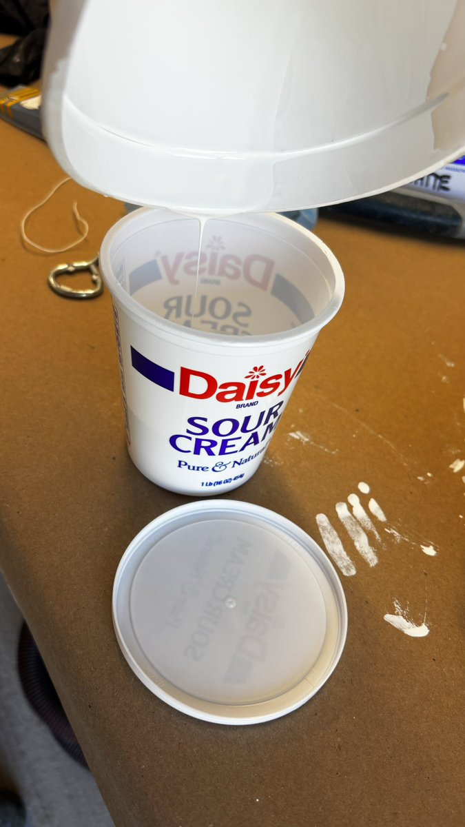 Store leftover paint in lidded sour cream or cottage cheese cups to avoid contaminating the gallon. It keeps the main supply fresh and lets you easily mix leftovers into your next session.