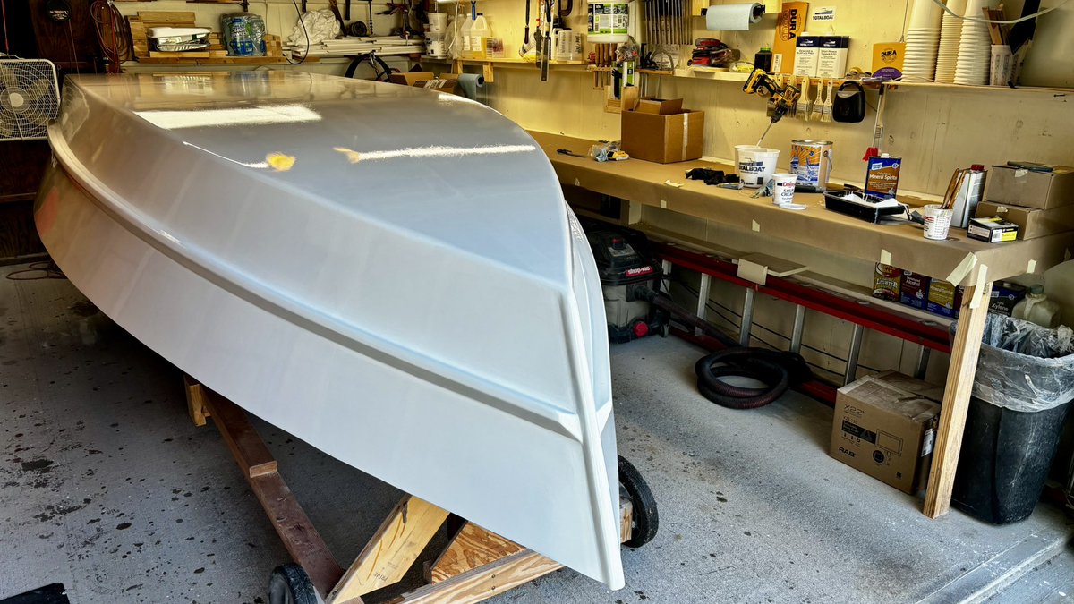 First coat of paint is on! The garage lighting and camera make it look gray, but it’s actually bright white. I am using George Kirby Jr. marine hull &amp; deck paint, in gloss white. Fantastic product!

#GeorgeKirbyJrPaintCo
#CoronaBrushes