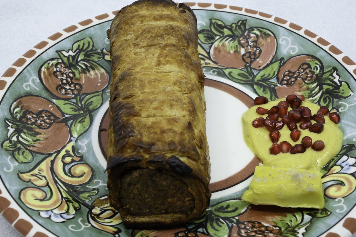 Baa Moo Oink sausage roll cooked in the Weber Q+. Served with some Dijon mustard studded with pomegranate arils plus a bit of New Zealand grass-fed butter.