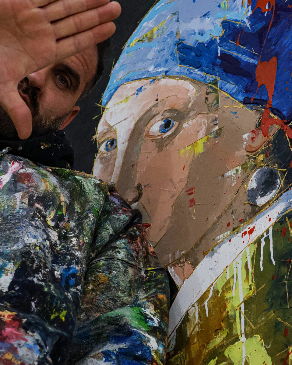 My Golden Lines aren’t just golden lines of paint, they stand for Recovery, Resilience, and Connection.

The painting featured in this photograph is my take on Johannes Vermeer’s “Girl with a Pearl Earring” titled “Pearls before Protest”