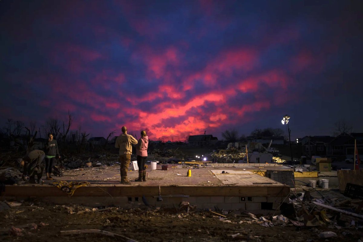 Someone posted this photo elsewhere yesterday, and I felt the need to share it here. It’s quite powerful, I'd like to say it's symbolizing peace in the aftermath of tragedy, as neighbors paused cleanup on a foundation of a destroyed home to admire the sunset in Cookeville, TN.