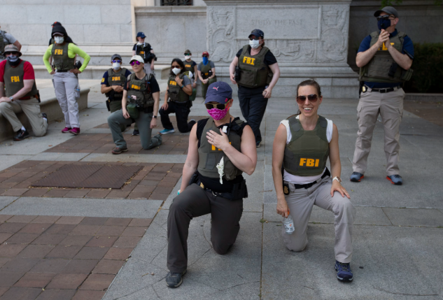 Rowena8529's tweet photo. The Federal Bureau of Investigation has fired as many as 20 FBI agents, including a group associated with a 2020 incident in which agents were photographed kneeling with demonstrators at the height of protests over the police killing of George Floyd, two people briefed on the matter said.
