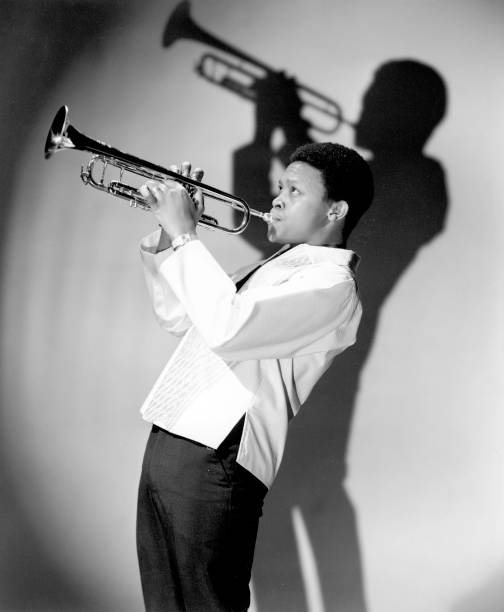 HistorySAZAR's tweet image. Jazz trumpeter Hugh Masekela poses for a portrait in circa 1967 in New York City, New York. Image Source: Michael Ochs Archives