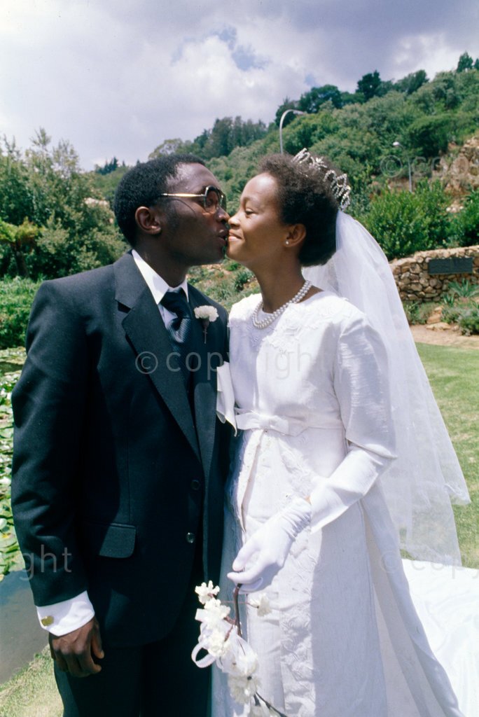 HistorySAZAR's tweet photo. Jomo Sono kisses his bride, Gail Sebetiele. He later led his soccer team, Orland Pirates, to victory over Highlands Park, February 1979. Image Source: Arena Holdings Collection https://t.co/bEHWrh4TzF