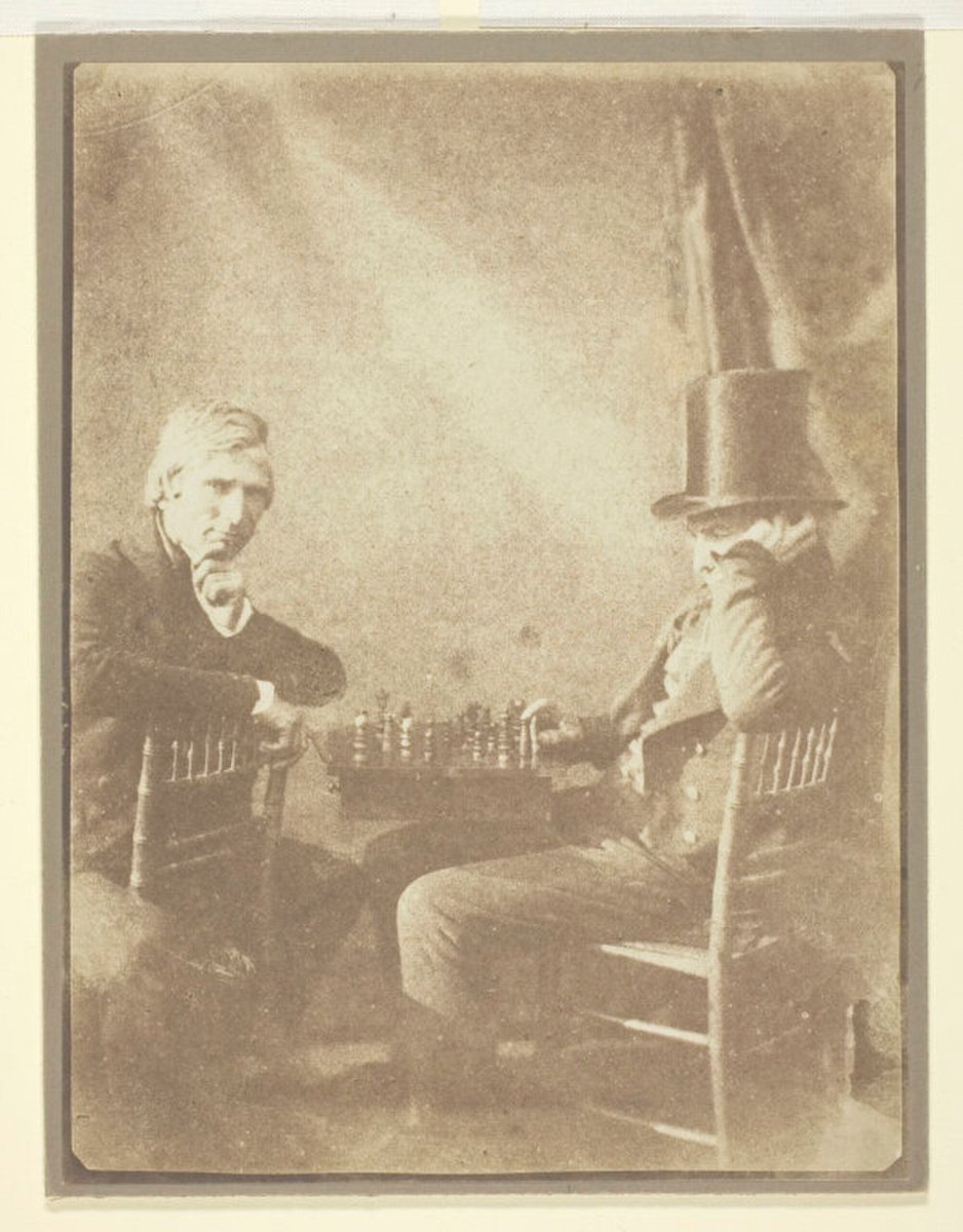 Two men playing chess, captured by early photography pioneer Henry Fox Talbot, 1847.