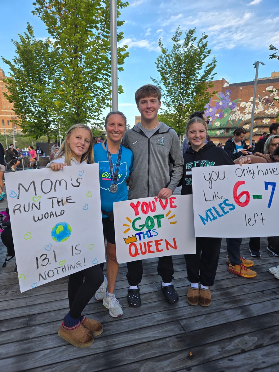 dudej4's tweet photo. Perfect morning for a run! Best signs from the best cheering section on the best day in Akron 💙 #runtheblueline @AkronMarathon @willtober_ https://t.co/GuN1FQoJl9
