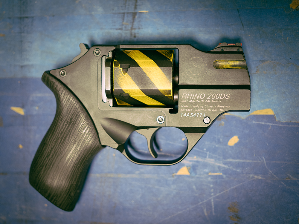 Firearms_Depot's tweet image. Caution: beauty with bite. ⚠️ This Chiappa Rhino 200DS wears a custom “caution tape” Cerakote — industrial, in-your-face, and oddly playful. It’s equal parts art and attitude: low-profile menace with showpiece vibes. Thoughts? 👇 #ChiappaRhino #Cerakote #CustomFirearms