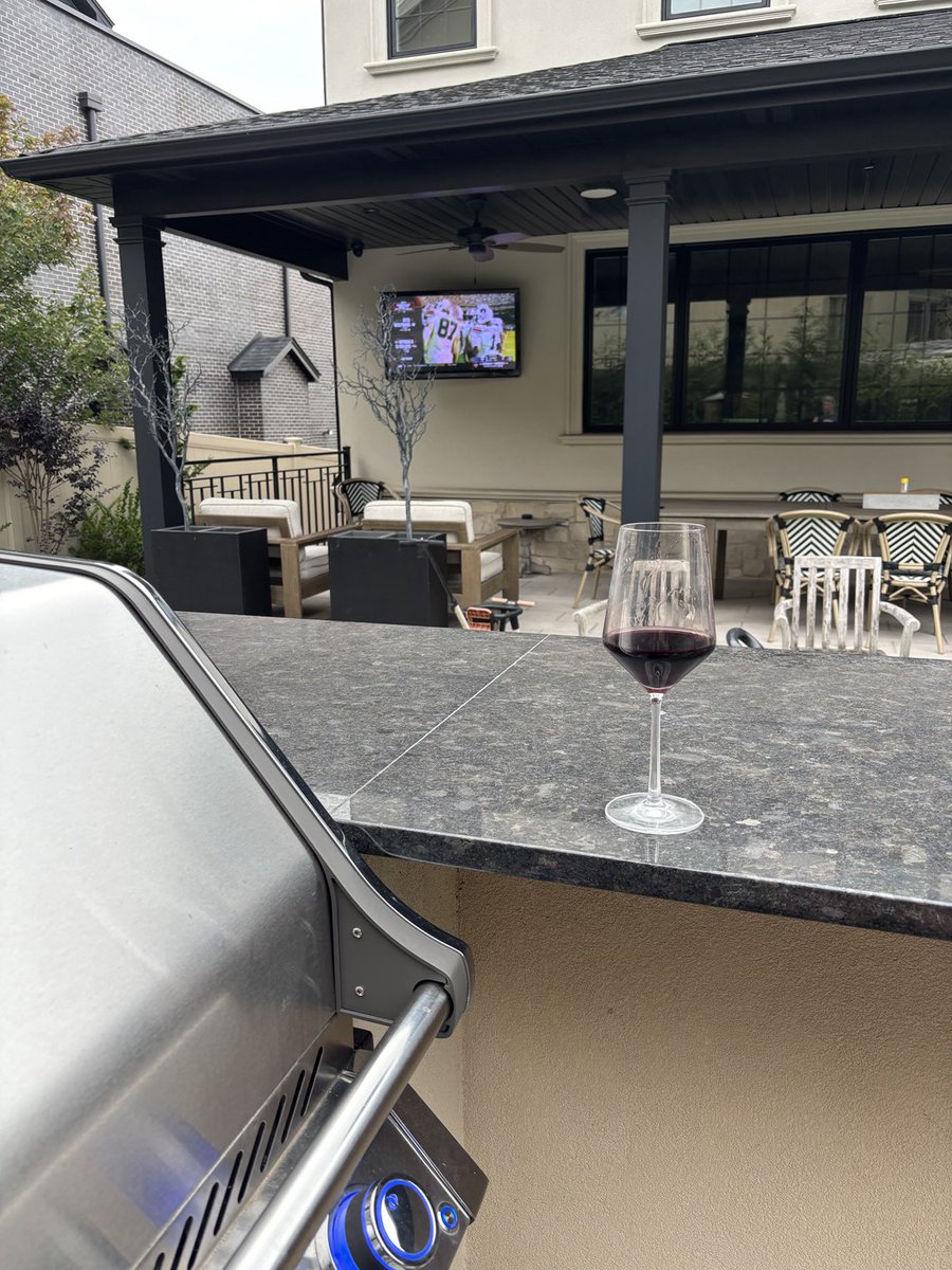 Watching the game while cooking steaks and enjoying some Cab Sav. With perfect weather.