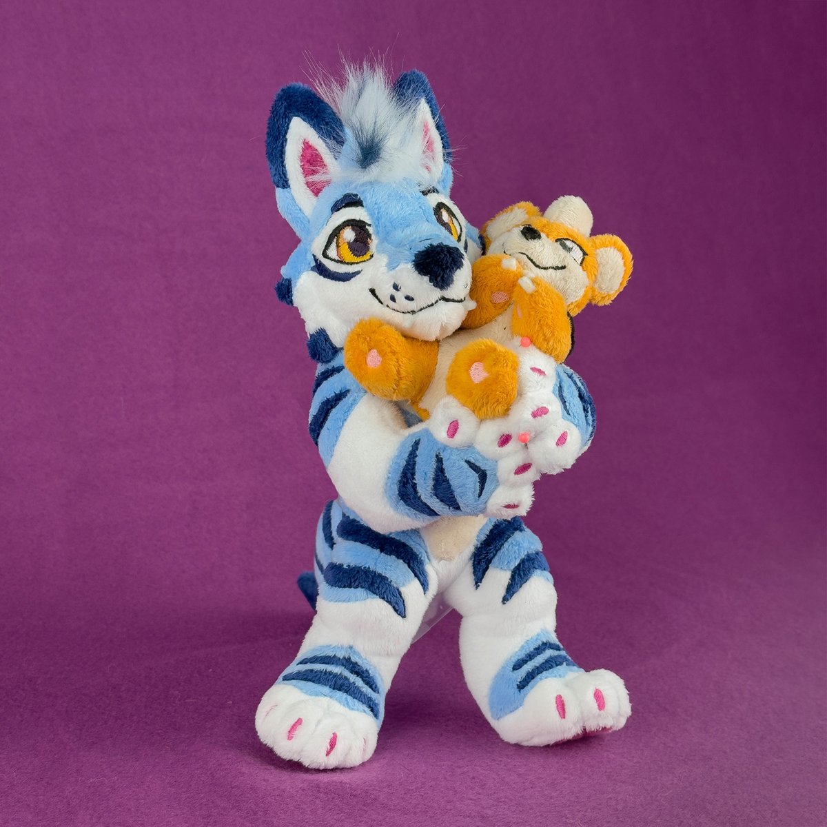 WispyChipmunk's tweet photo. More photos! She's about 11" tall and is filled with plastic pellets for that beanie baby feel. She has jointed arms and can sit or stand. I made her a teeny growlithe buddy as a fun lil extra from me since he's once of our favorite pokemon. xP https://t.co/RGP6y6feul
