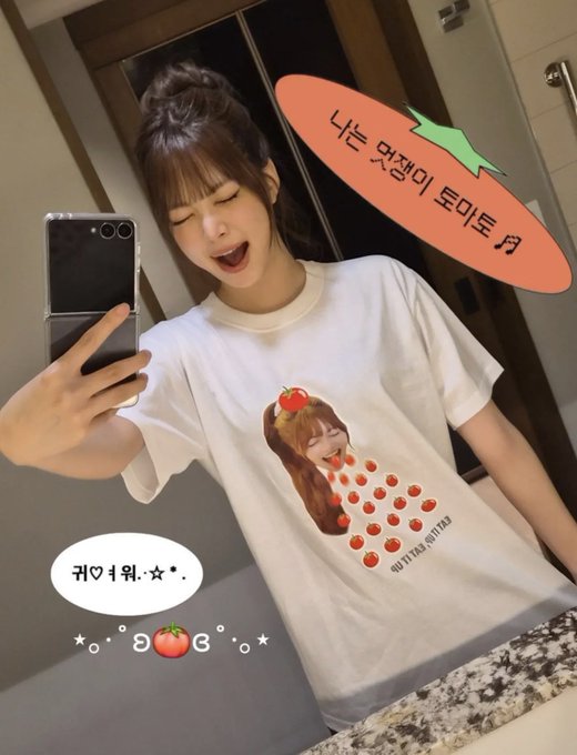 Hong Eun Chae posing in a mirror selfie, wearing a sleeveless ruffled top and jeans, making a peace sign with one hand and holding a smartphone with the other. Hong Eun Chae in another mirror selfie, wearing a white T-shirt with a tomato-themed graphic, holding a smartphone. Hong Eun Chae in a close-up selfie, wearing a lace top and a necklace, winking at the camera. Instagram watermarks are visible.