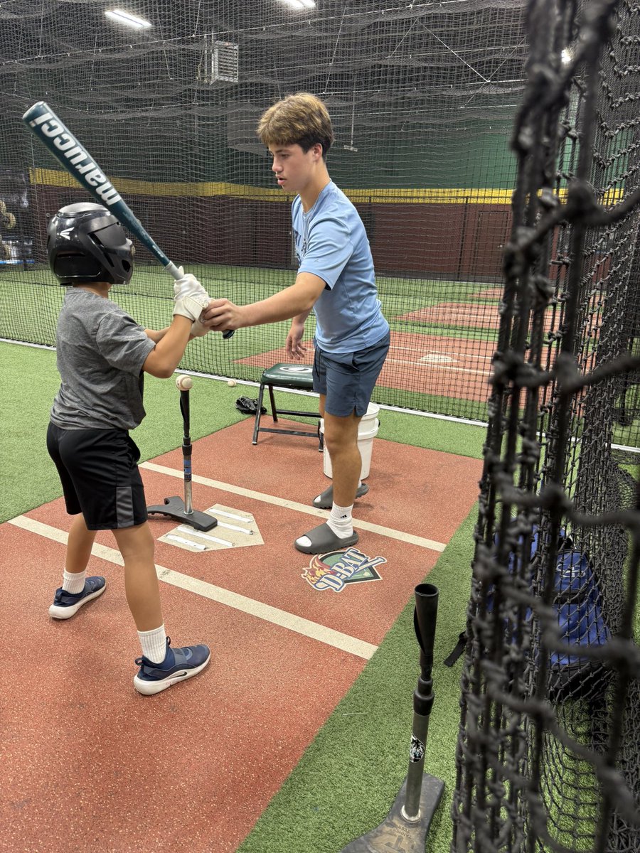 Teaching young kids the game reminds me why I 🩵 ⚾️. I want them 2 feel the passion that drives me. Giving lessons lets me share my skills, connect, &amp; grow as a leader. I 👀a future in coaching, performance, &amp; helping athletes reach their goals. #baseballrecruit #uncommitted2028