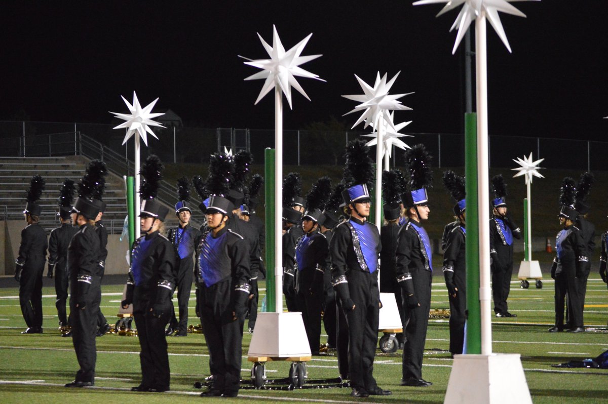 .<a href="/MNHS_Band/">Millard North Band</a>  definitely in their element with night time finals! #TMI25