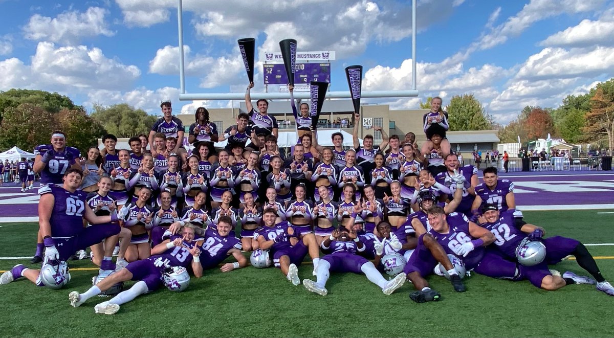 An awesome Homecoming. 52-22 win, beautiful weather, huge cheer alumni turnout and a great team pic with some of the boys. #westernu, #westernmustangs, #westerncheer, #runwithus