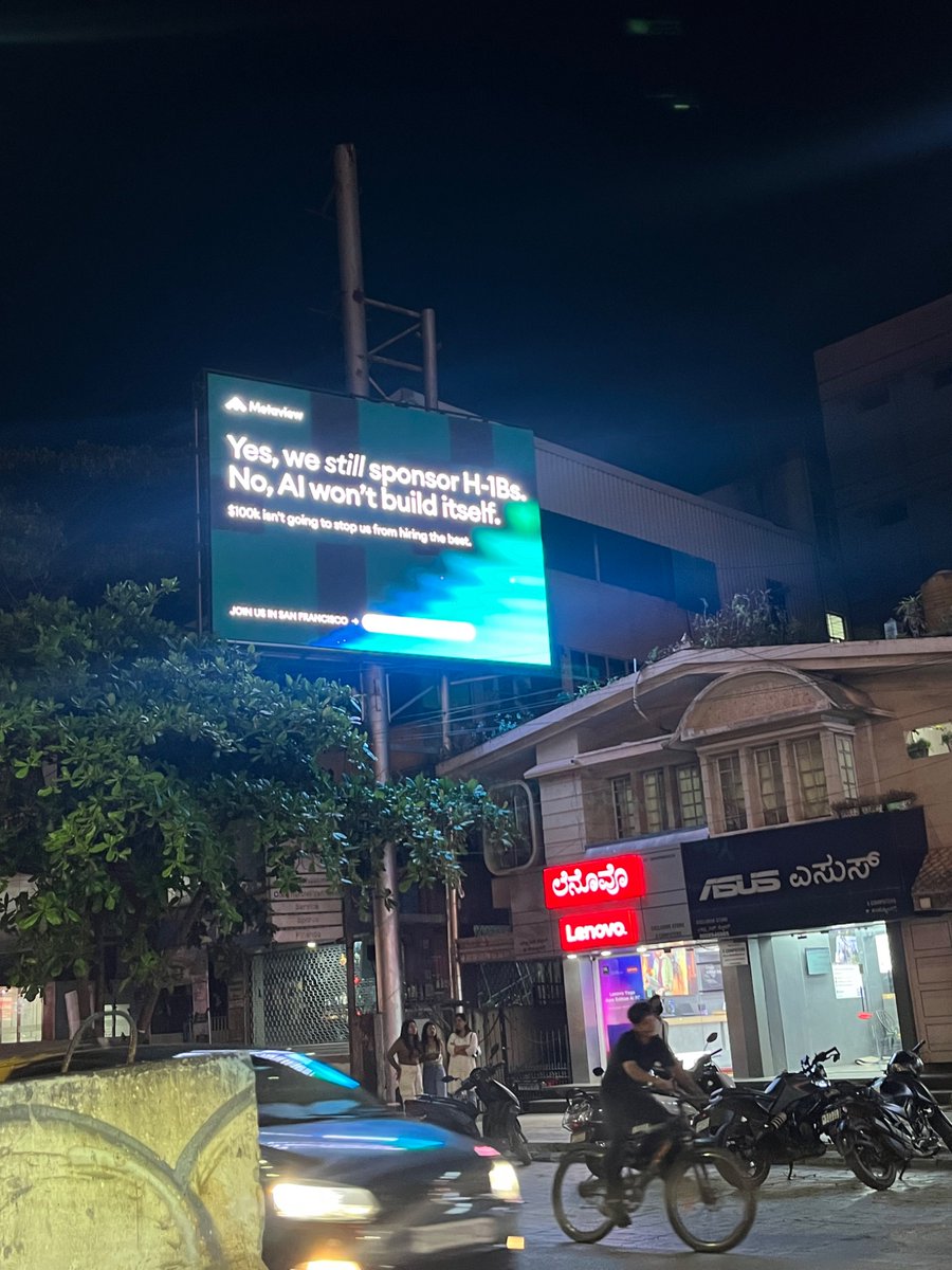 thereal_arvind's tweet photo. Probably the only city in India you’ll find this billboard. 

@peakbengaluru 
#h1bvisas https://t.co/fk33rzxKff