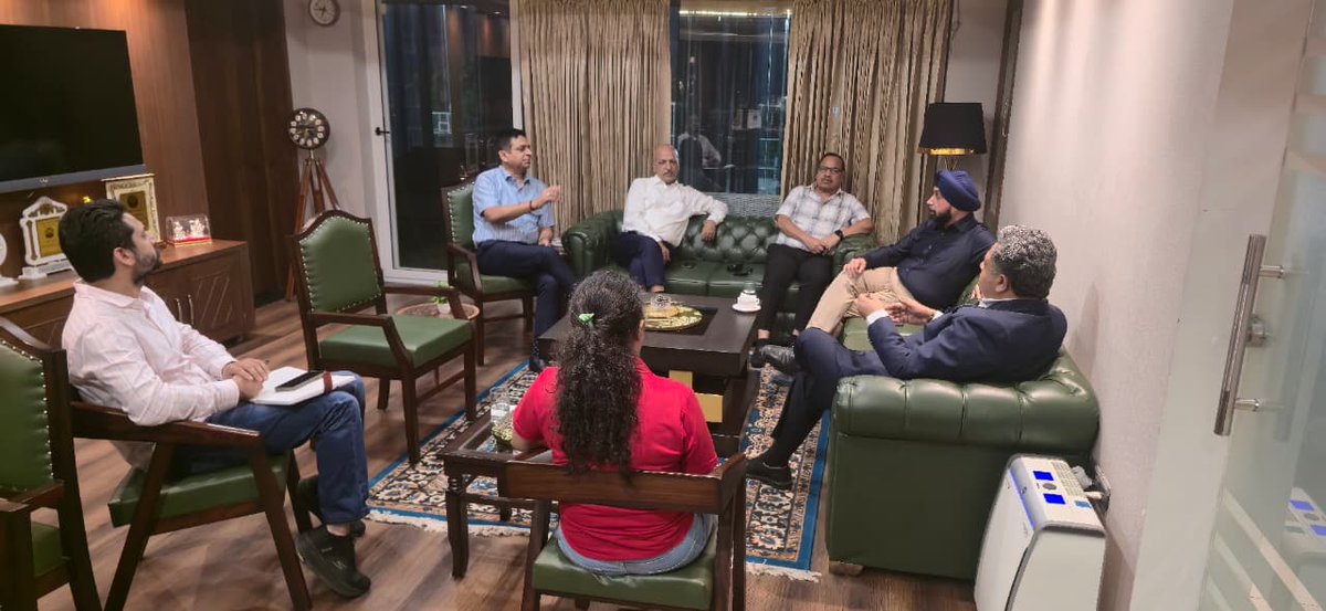 Dr. Anirudh Gupta, VP-Education Initiatives at Club 21, held a meeting deciding to provide scholarships to EWS students for higher education and assist RTE students with essentials like bags, uniforms, shoes, and tiffins, with several community members present.