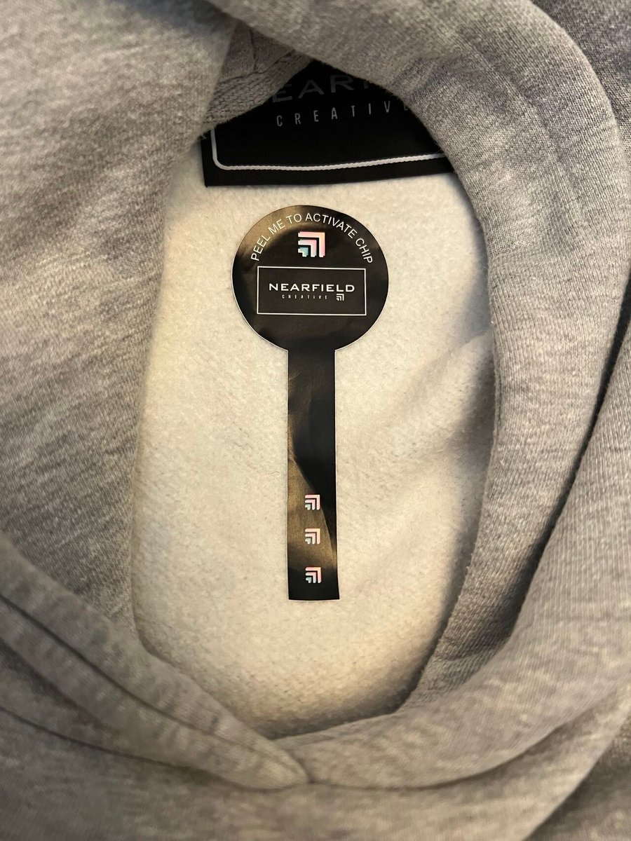 Protection stickers (Soft fabric stickers, leaving no mark on the fabric when peeled) to protect against any unauthorized scanning while the garments are on sale in-store. 

Removing the sticker activates the chip ready for interaction.  

Tested on a range of NearField Creative