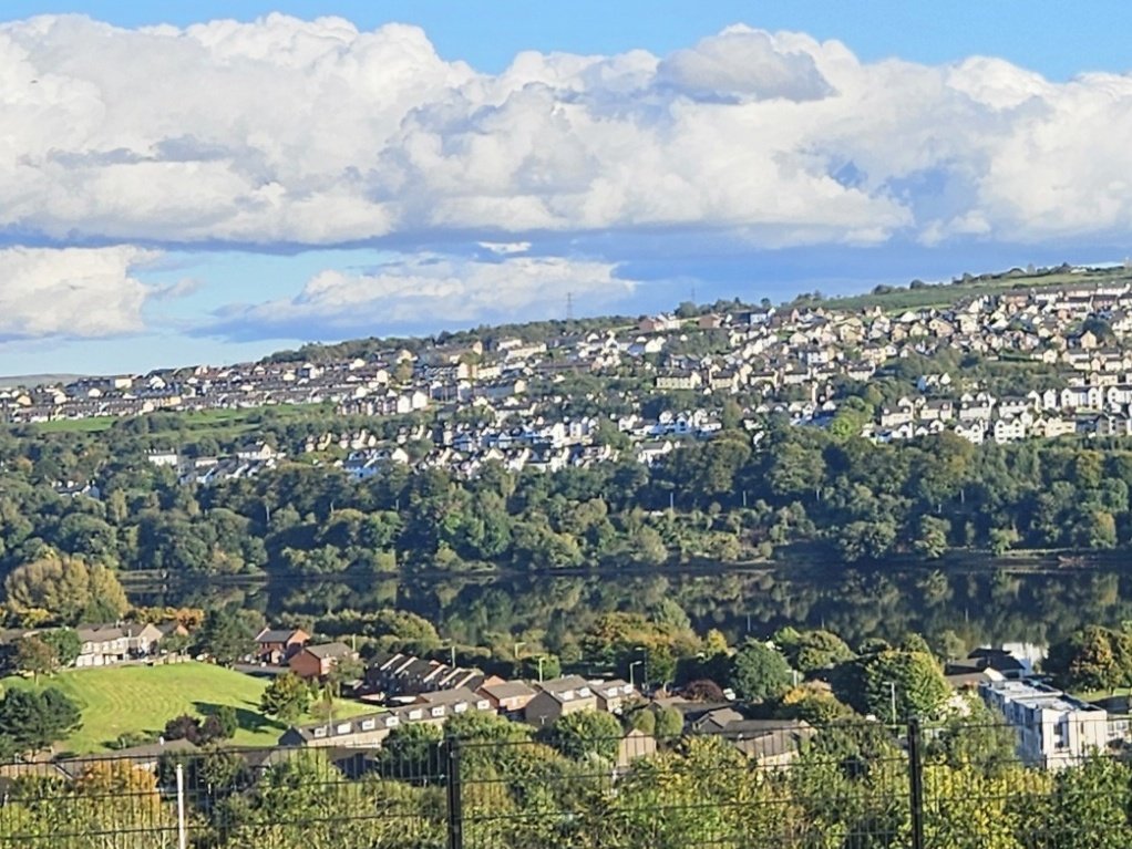 The river Foyle in Derry like a mirror 
Not a ripple in sight.