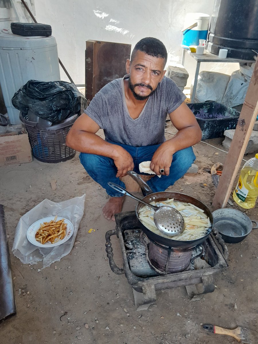 We are still homeless, just a torn tent that doesn't protect us from the cold or rain 💔⛺. We live between fear and hunger, waiting for God's mercy and the prayers of good friends 🙏🤲. Even my loyal friend 🐶 Max can't find a place to shelter