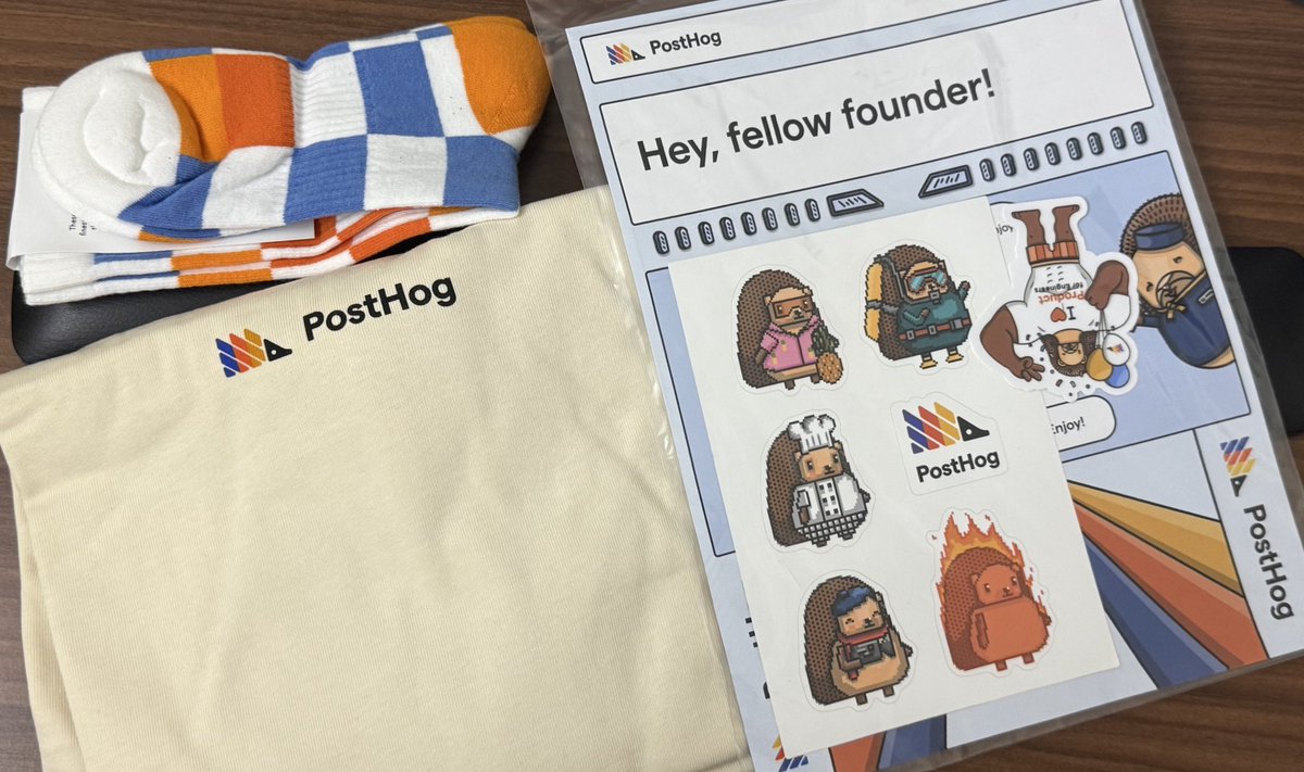 cool merch from <a href="/posthog/">PostHog</a> for startups. it includes a posthog paper airplane 😄