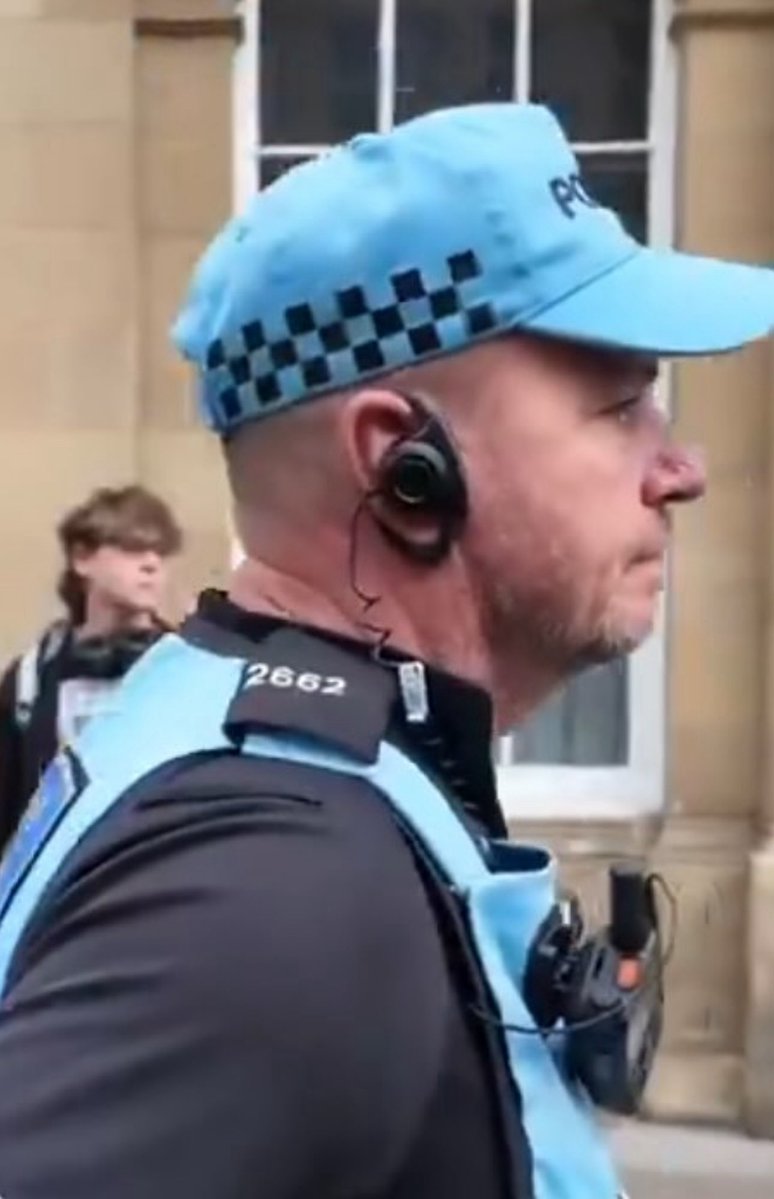 This is the lowlife Police liaison officer (2662) that ripped a Union Jack out of the hands of a patriotic young girl on Saturday. To complain about him to the IOPC, go here:

policeconduct.gov.uk/complaints/sub…