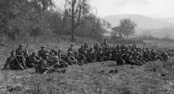 You're looking at survivors of the the U.S. Army's 77th Division — aka the "Lost Battalion." More than 550 men of the unit stormed the Argonne Forest on this day in 1918. They were cut off, surrounded and relentlessly attacked for a week; fewer than 200 made it out.