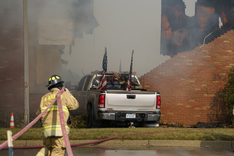Additional image of the alleged suspect's truck showing the same license plate:

mlive.com/news/flint/202…