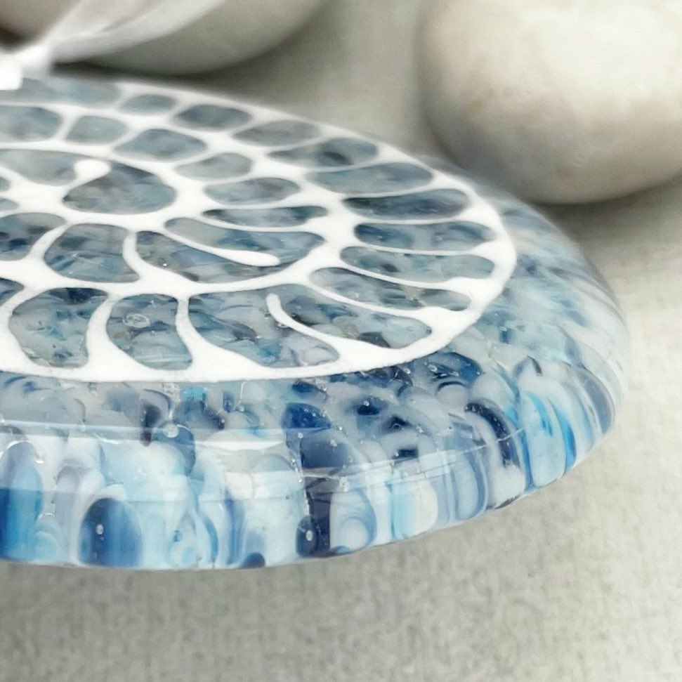 With all the excitement of my Folksy shop opening, I’ve had little chance to fire up the big kiln this week! 
I use some homemade frit in these Ammonite circles (…that’s crushed glass!) it’ll blend and soften with 1st firing💙
#folksy 
#shophandmadeuk #shopsmall #fusedglassgifts