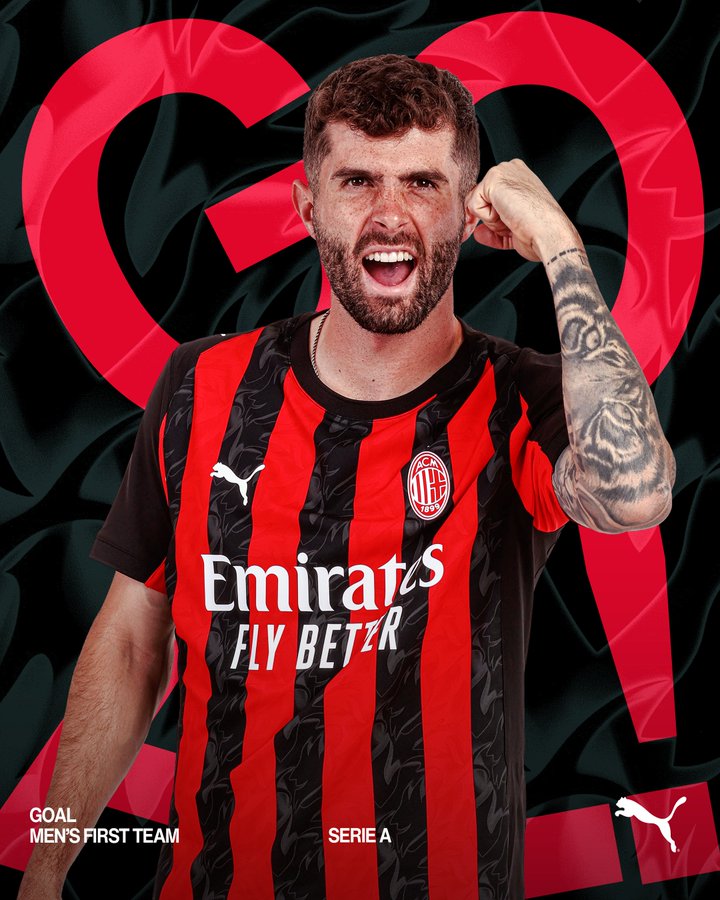 Christian Pulisic wearing an AC Milan jersey with red and black vertical stripes, featuring the Emirates "FLY BETTER" logo. He has tattoos on his left arm and is flexing his right arm with a clenched fist. Text overlays include "GOAL MEN'S FIRST TEAM SERIE A" and the Puma logo.