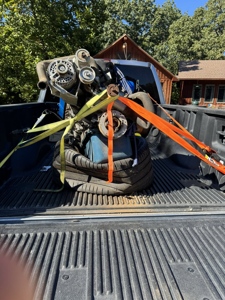 Nanny was operating the tractor while I centered the motor to set perfectly on the tire.  After the 5th attempt I said we’re good!!!! I told nanny no one ever guess we fell in love while riding to school on the short bus!