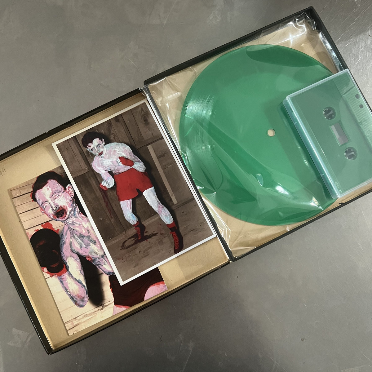 BradLaner's tweet photo. 12 copies remaining of this edition of 25 cassette / lathe cut 7" by your pal, me. https://t.co/1wvF1Nt9cY https://t.co/wU4dNFzqD5