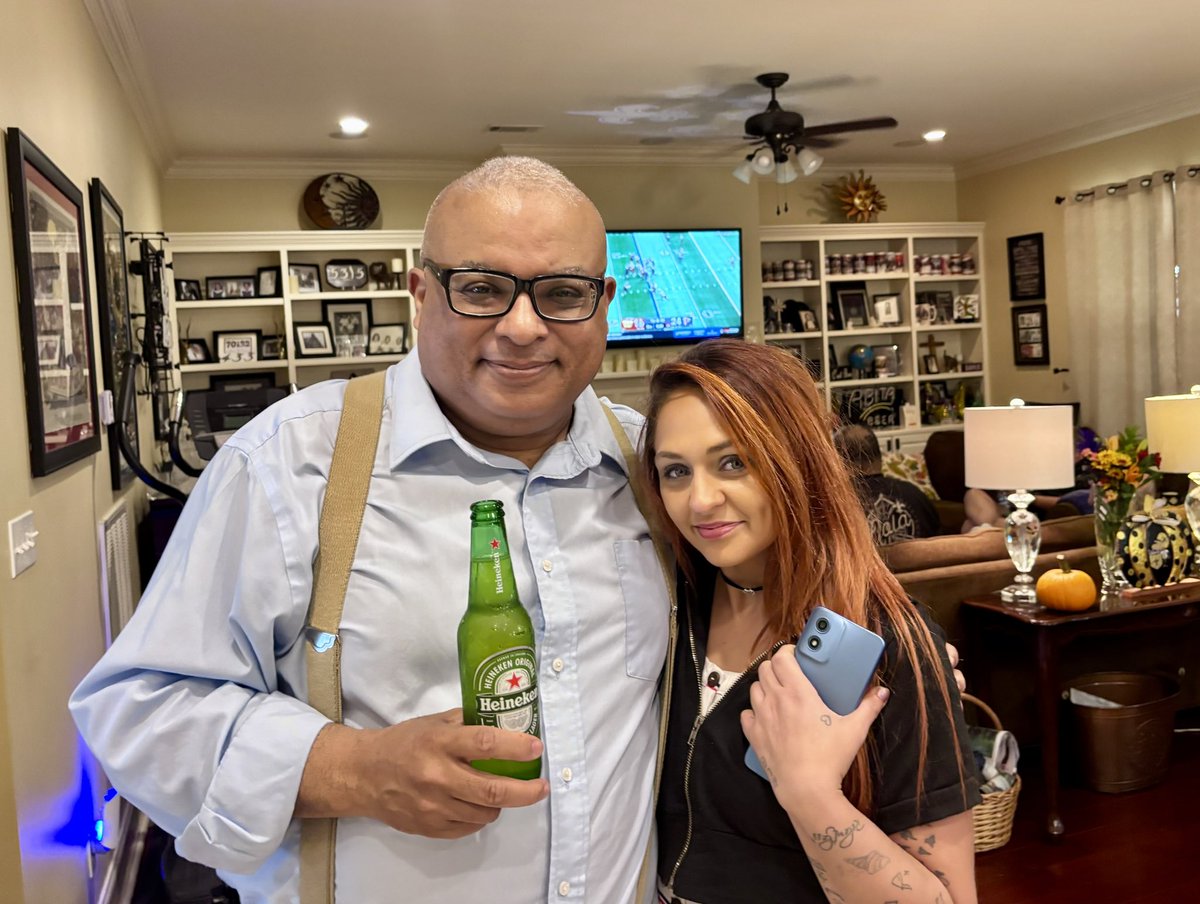Football Sunday with girlfriend and my family members. ￼ With the way the Saints and LSU offense are playing, I’m going to need more Heineken.￼