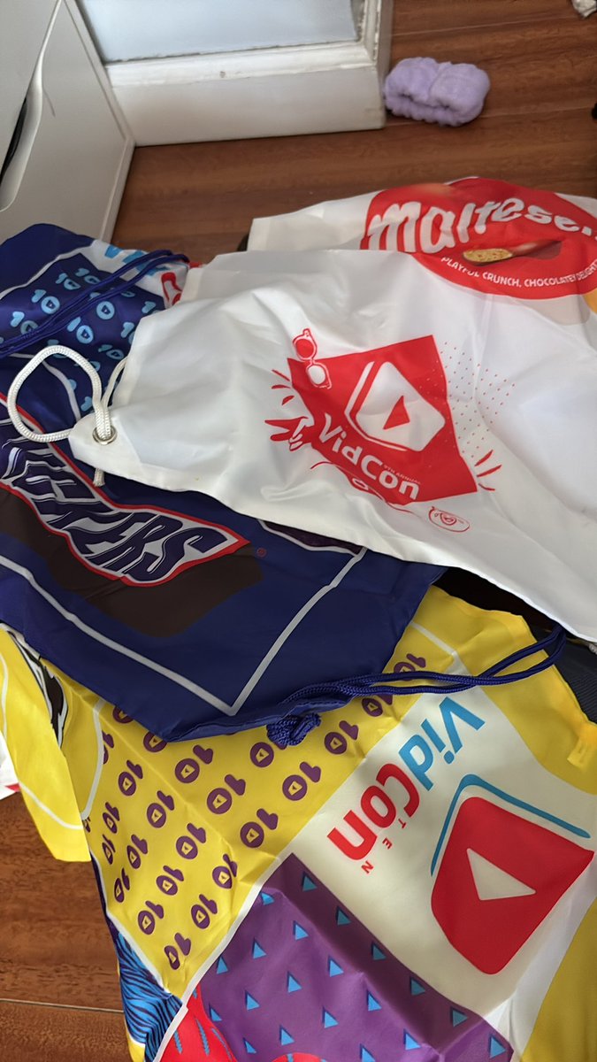 mynameisjerika's tweet photo. vidcon drawstring bag giveaway cause why the fuck do i have 30 https://t.co/WDPaWXwiSp