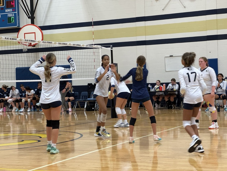 The blue &amp; gold ladies chased off the Covington cougars with wins in both sets.
